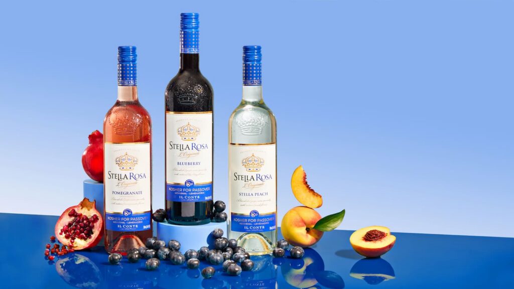 Stella Rosa Pomegranate, Blueberry, and Peach kosher wines with fresh fruit for a festive Rosh Hashanah celebration.